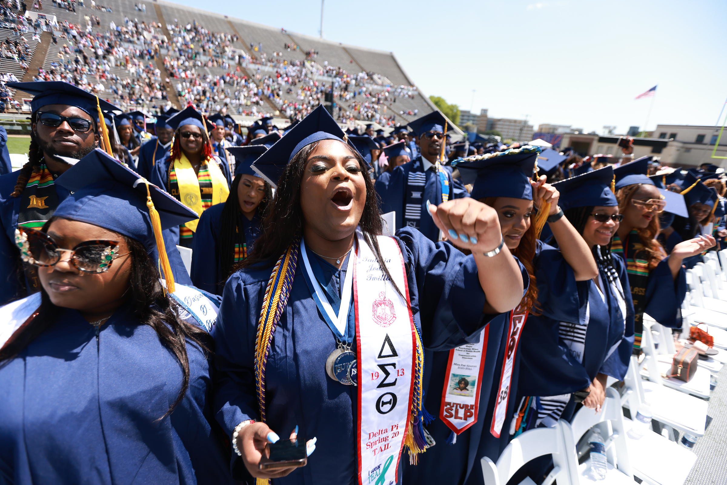 2022 Undergraduate Commencement class break out in celebration over the culmination of their undergraduate career. (Charles A. Smith/University Communications)