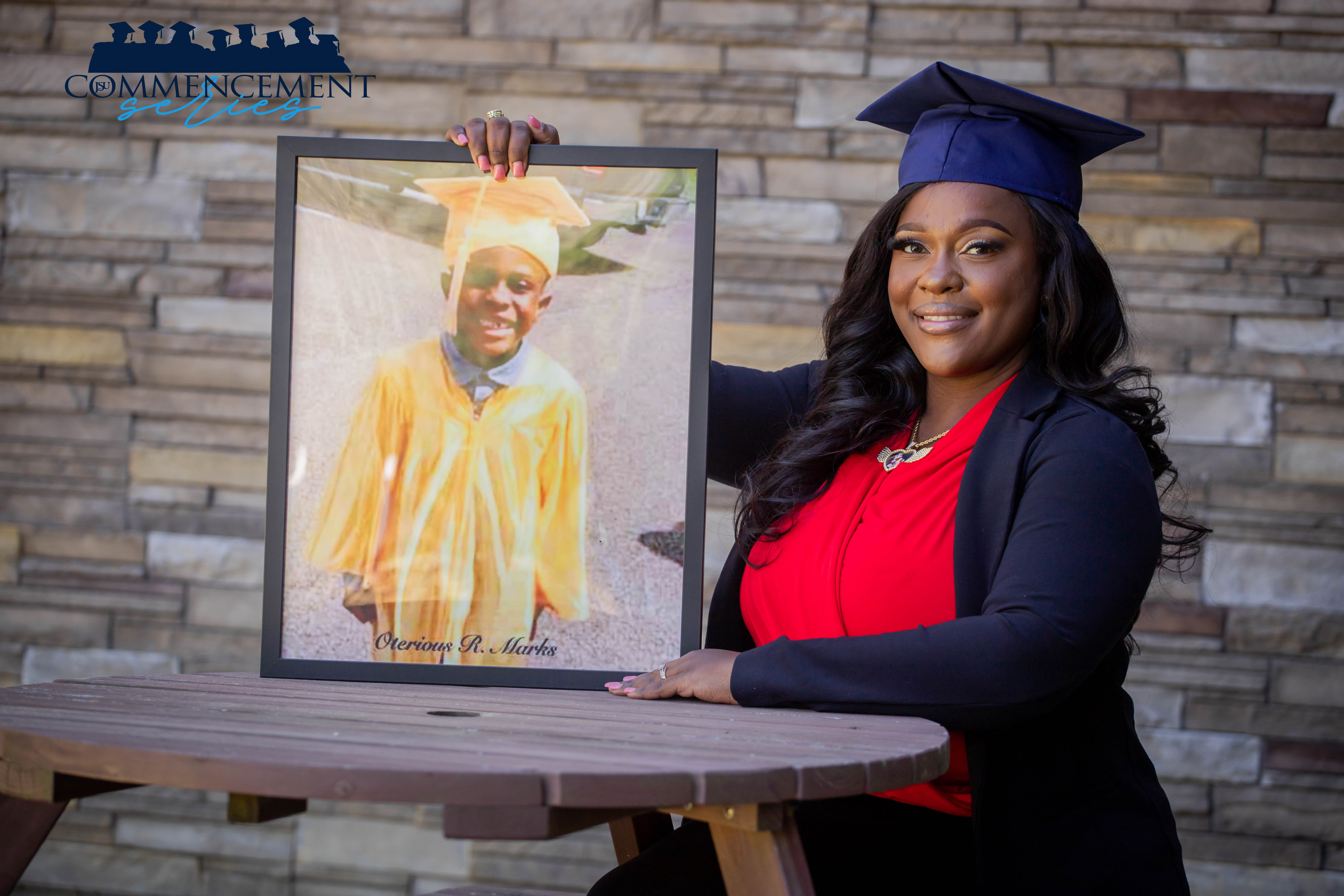 Kyoukius Washington turned pain into triumph, using the recent death of her 6-year-old son as reason to continue her education. She graduated from JSU on Saturday, April 30. "I'm doing this for him," she said. (Photo special to JSU)