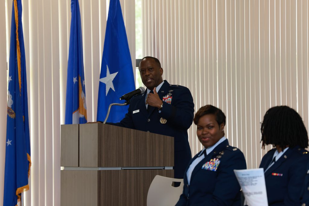 Keynote speaker, Brigadier General Ronald E. Jolly speaking to the commissioning class about the importance of trust, resilience, and exemplarary leadership. (Photo Credit: Charles A. Smith/University Communications)