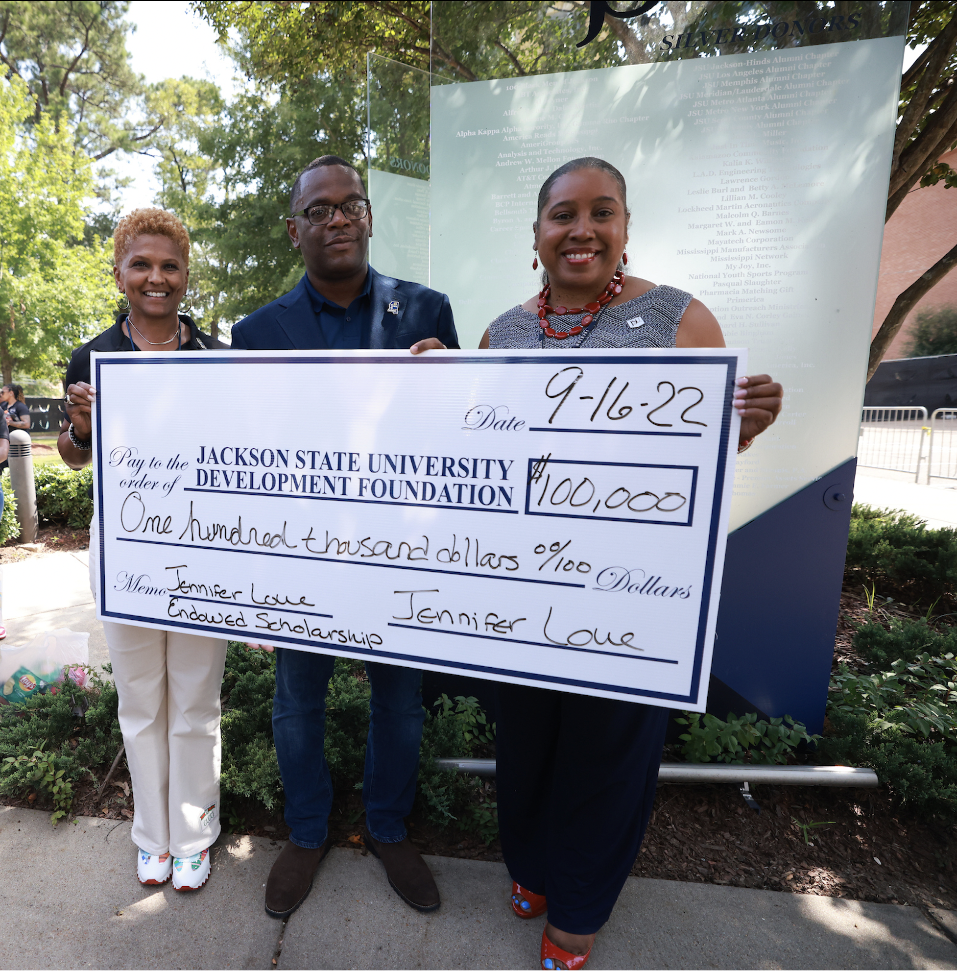 Jennifer Love(far left), a 1983 graduate of Jackson State University, aims to provide financial resources to students looking to explore law enforcement careers. Love is pictured with JSU President Thomas K. Hudson, J.D. (center) and Yolanda Owens, interim vice president of the Division of Institutional Advancement. (Photo by Charles A. Smith/JSU)