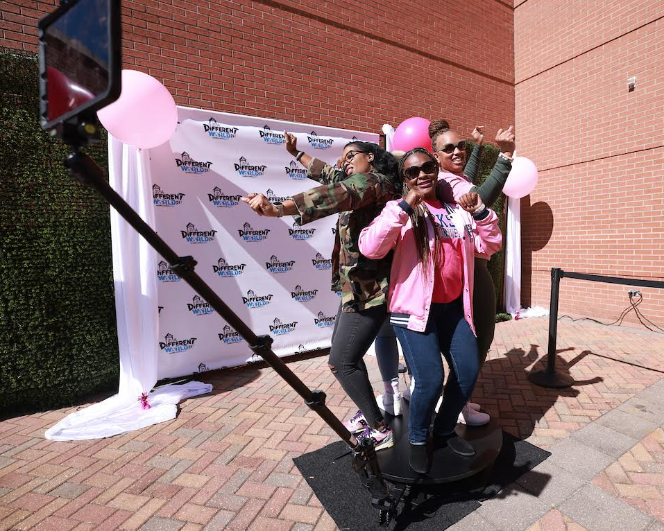 Jackson State University employees have fun with the 360 photo booth during a celebratory Pink Out party on Wednesday, Oct. 19, highlighting JSU's Breast Cancer survivors as part of their Breast Cancer Awareness Month initiative during the university's homecoming week of events. (Photo by William Kelly/JSU)