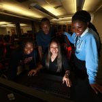 Dr. Almesha Campbell, Ph.D., associate vice president for research and economic development, with JSU Innovation Fellows inside the JSU Center for Innovation.