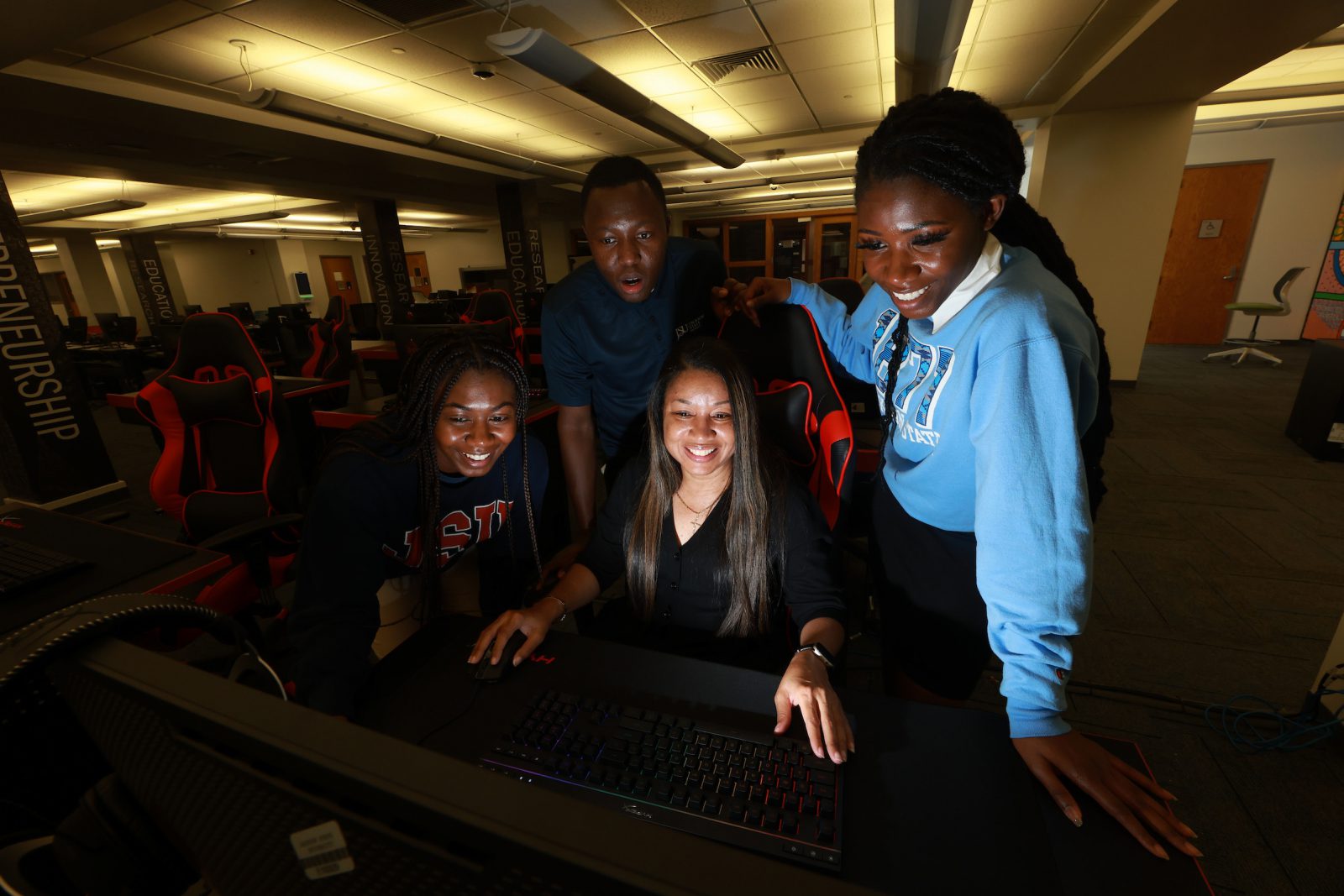 Dr. Almesha Campbell, Ph.D., associate vice president for research and economic development, with JSU Innovation Fellows inside the JSU Center for Innovation.