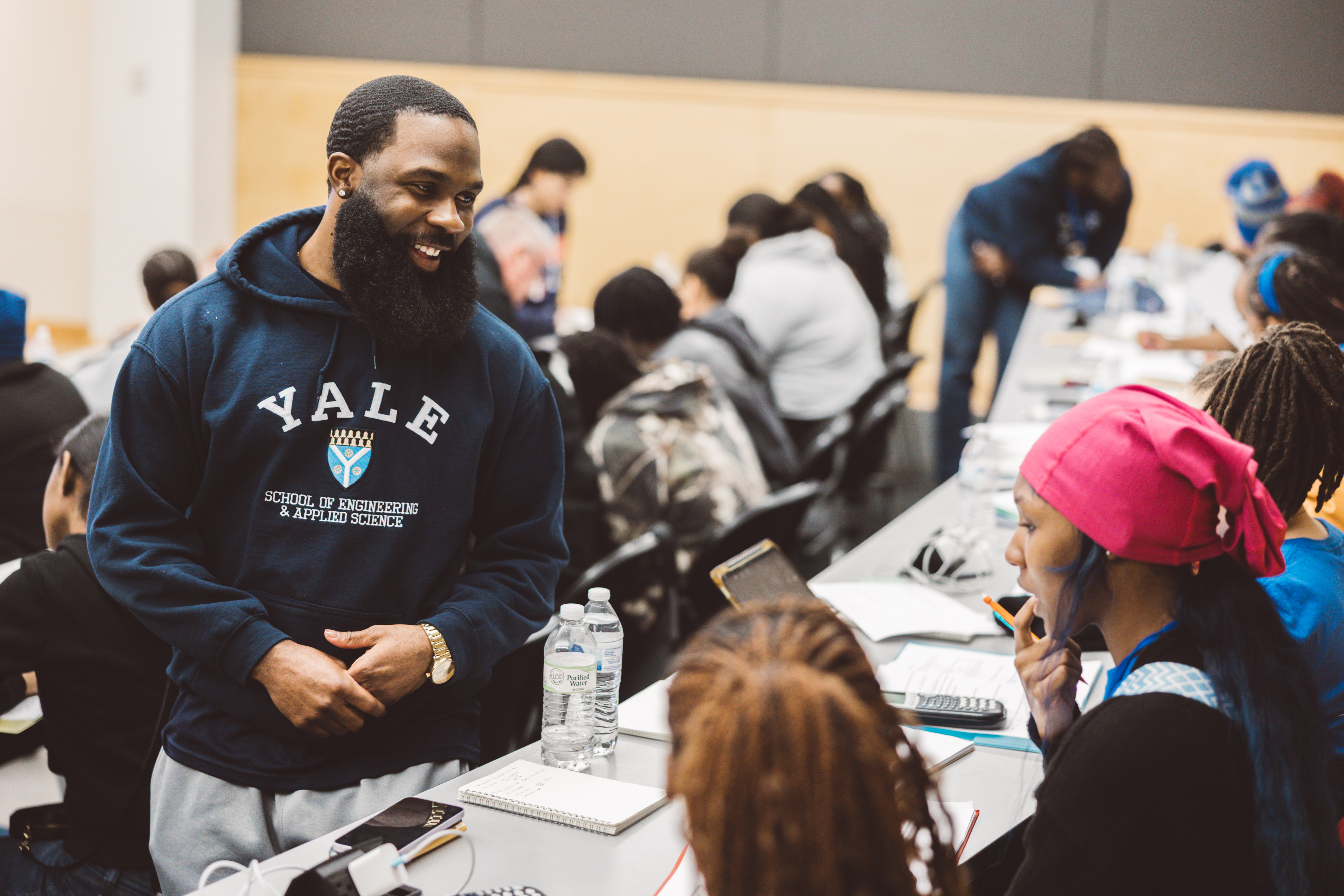 Tutor and students discuss coursework at the 8th Annual Advanced STEM Winter Program at JSU's College of Science, Engineering and Technology