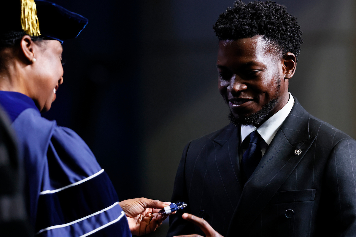 male student receives medal