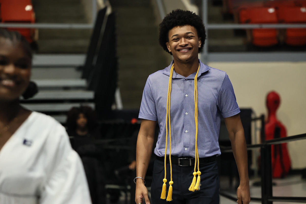 male student walking