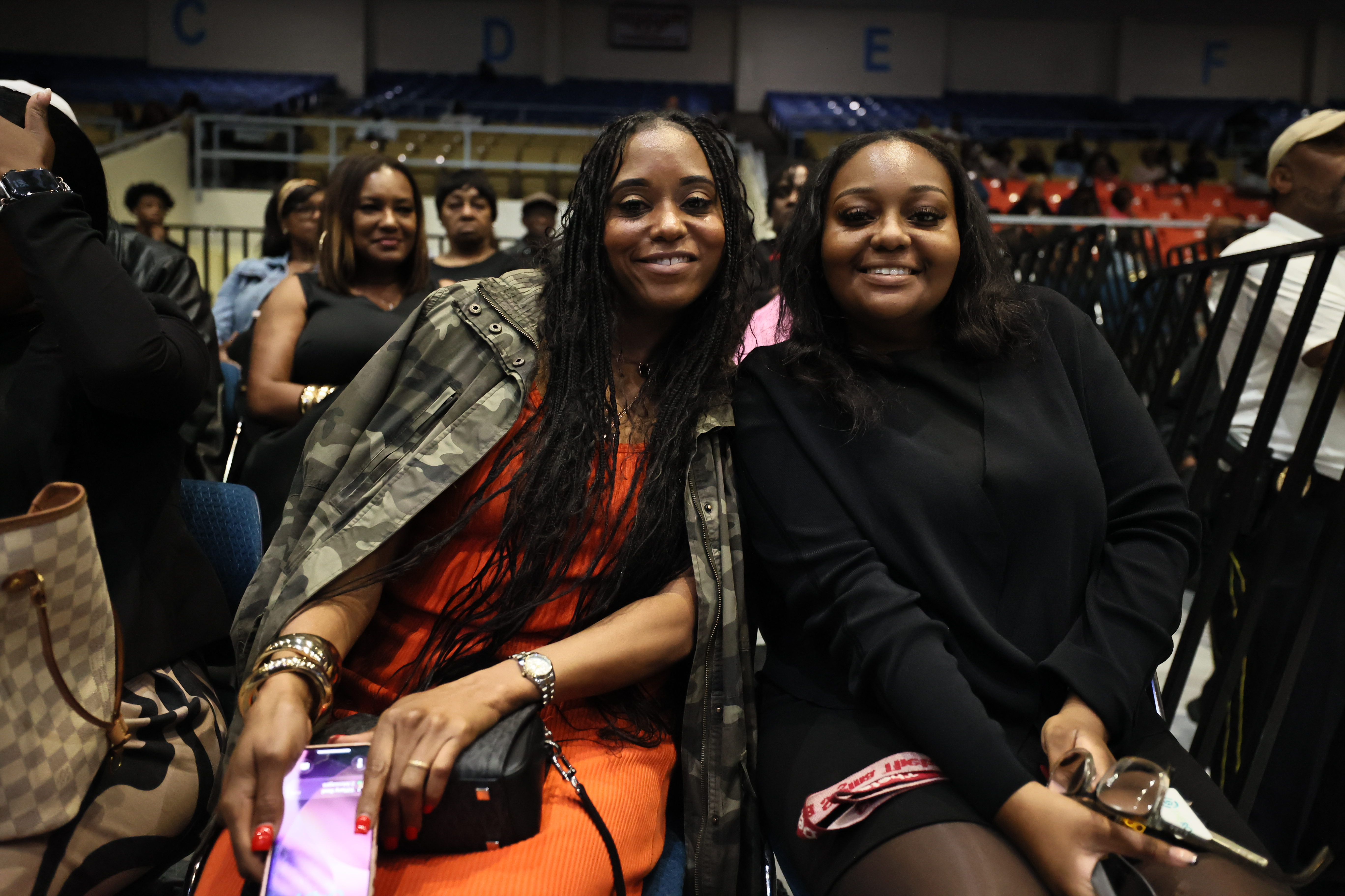 two ladies smile