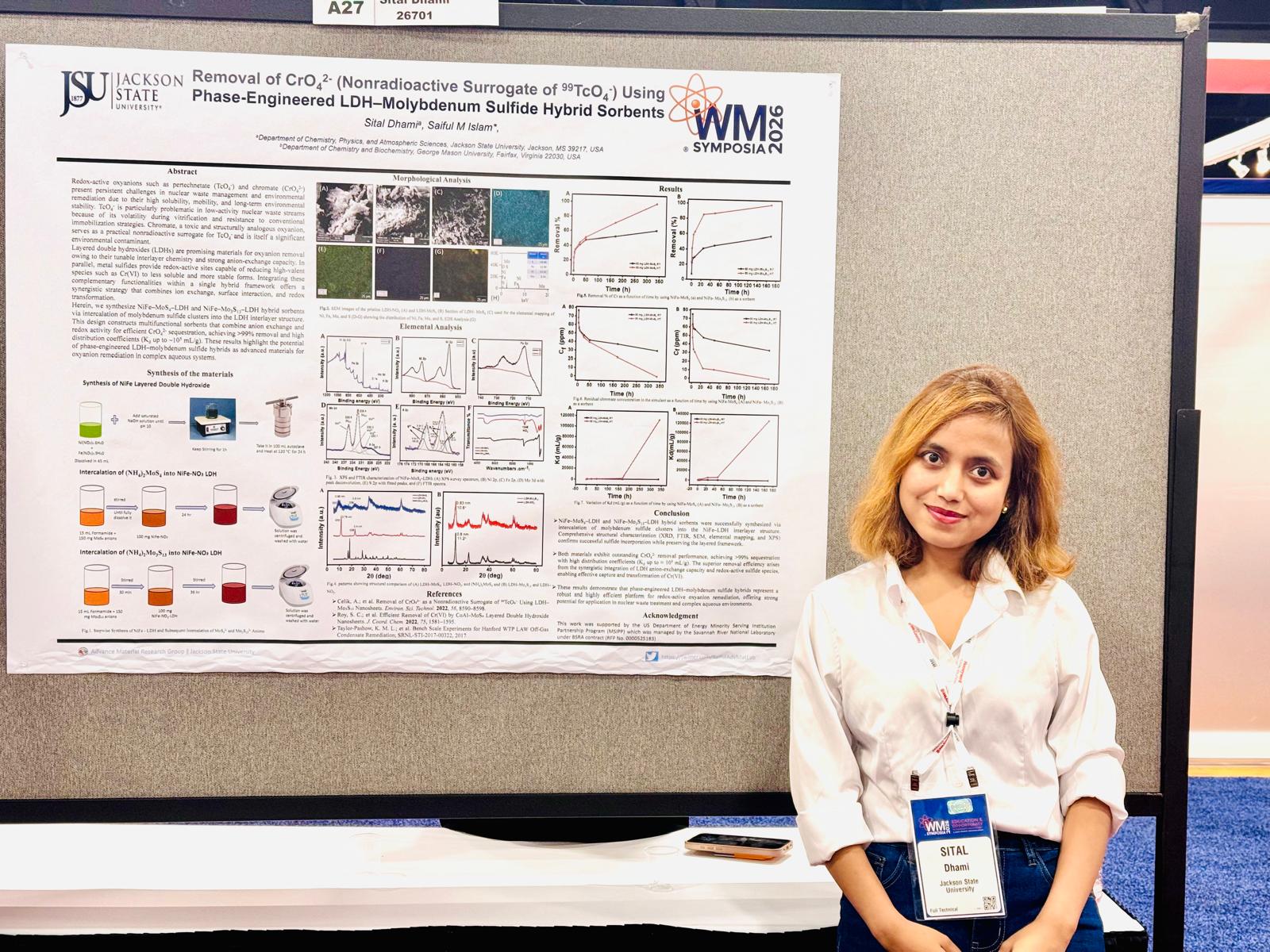 JSU chemistry doctoral student Sital Dhami stands in front of a display showcasing her research at the WM2026 Conference hosted by WM Symposia.